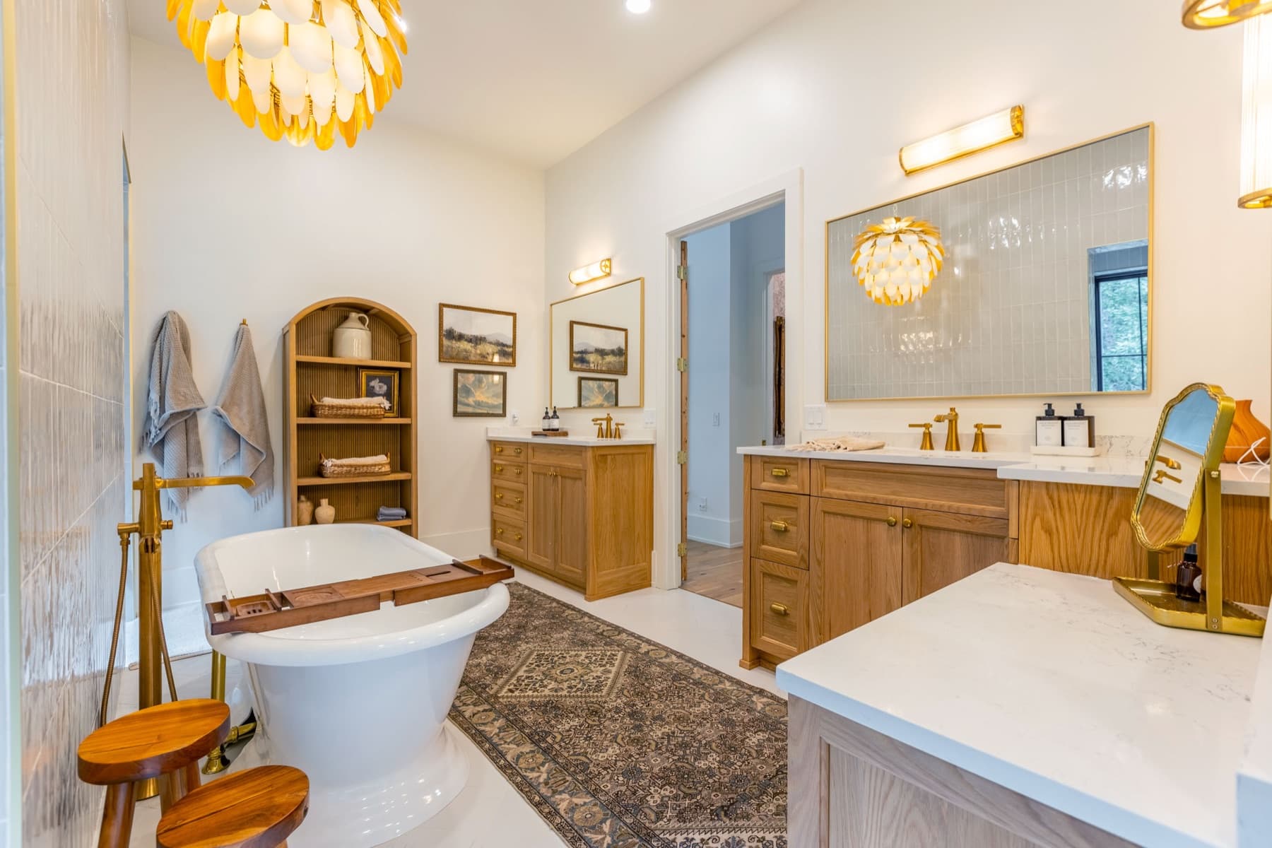 Bathroom with soaking tub and custom vanity