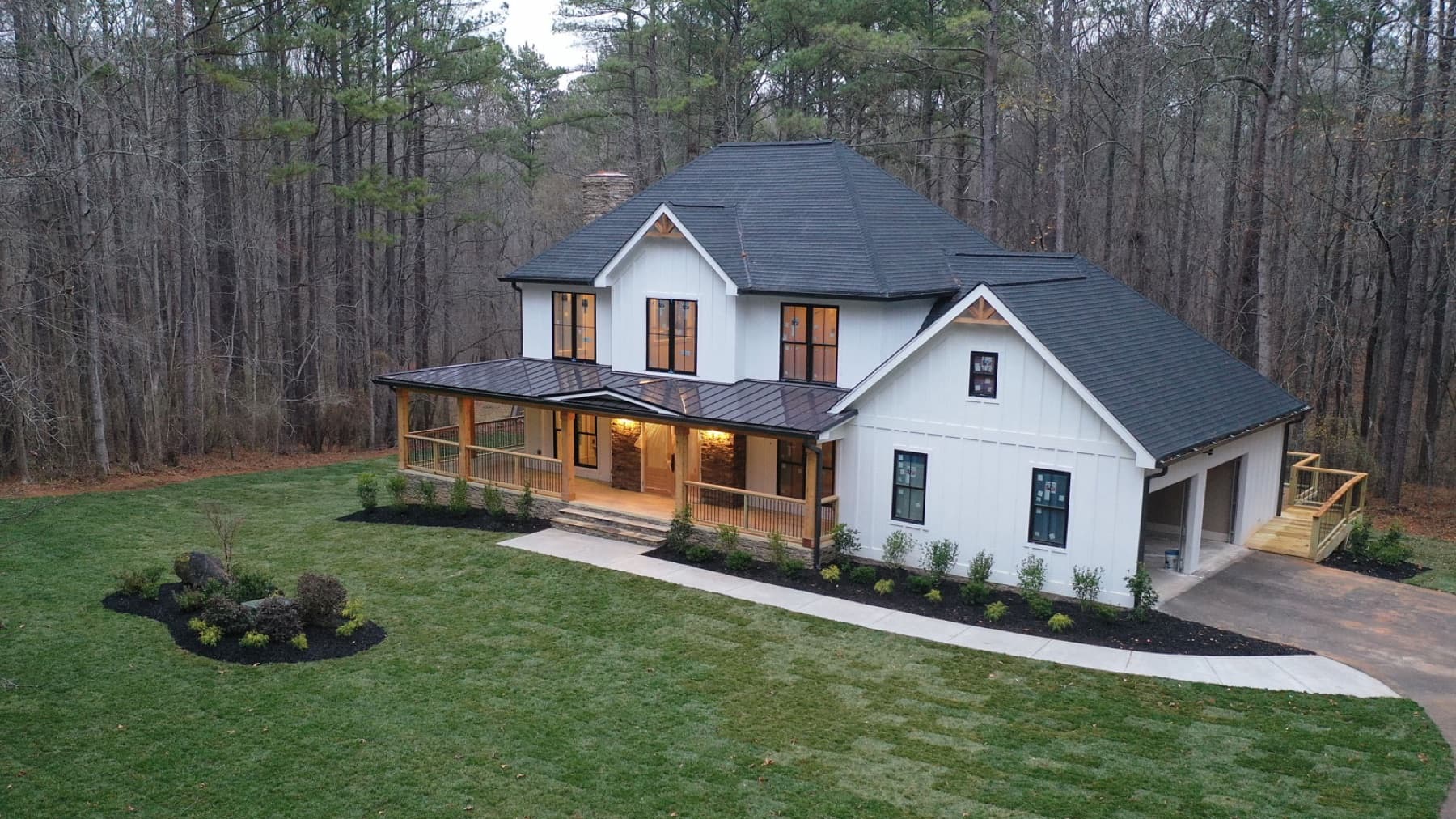 Farmhouse exterior with wraparound porch